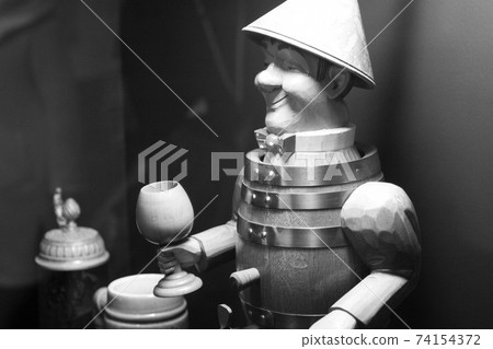 Wooden doll with beer glass Wooden doll with beer glass 74154372