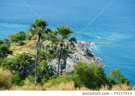 Tourists at Phromthep cape viewpoint at the south of Phuket Island, Thailand. Tropical paradise in Thailand. Phuket is a popular destination famous for tourists 74157914