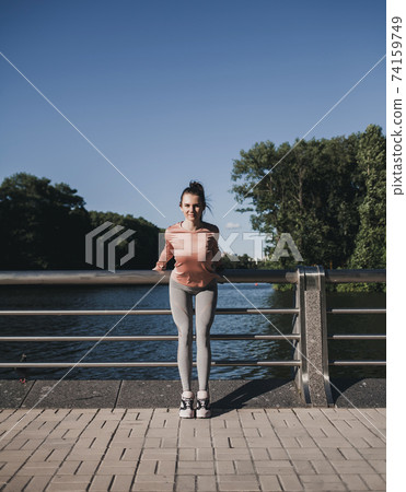 beautiful girl of athletic build rests beautiful girl of athletic build rests 74159749