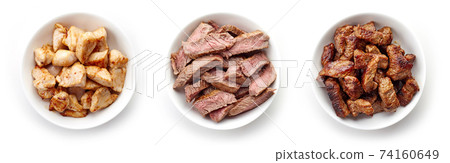 Bowls of various grilled meat from above Bowls of various grilled meat from above 74160649