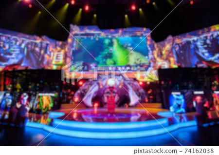 Abstract blurred background of big esports gaming event at big arena. 74162038