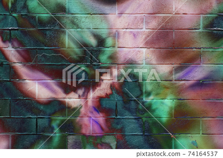 Brick wall. Abstract beautiful street art colorful graffiti style closeup. Iconic urban culture youth 74164537
