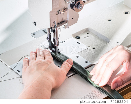 craftsman sews green belt on sewing machine craftsman sews green belt on sewing machine 74168204