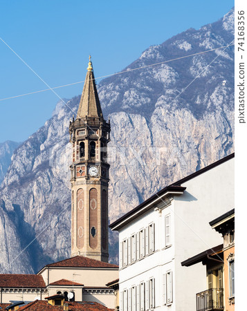bell tower San Nicolo over houses in Lecco city 74168356