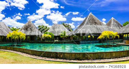 Luxury spa territory in Mauritius island with bungalows and swim pool Luxury spa territory in Mauritius island with bungalows and swim pool 74168928