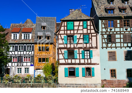 Charming half timbered houses of old town in Strasbourg. France Charming half timbered houses of old town in Strasbourg. France 74168949