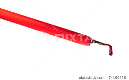 red ink drop is hanging on the tip of nib pen red ink drop is hanging on the tip of nib pen 74169658