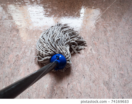 cleaning floor by rope mop cleaning floor by rope mop 74169683
