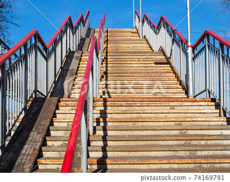 bottom view of high outdoor steel stairs 74169791