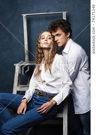 young pretty boy and girl friends happy smiling together in interior, emotional couple, lifestyle people concept 74171146