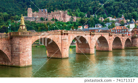 medieval Heidelberg - view of famous Karl Theodor bridge and castle. Germany medieval Heidelberg - view of famous Karl Theodor bridge and castle. Germany 74171317