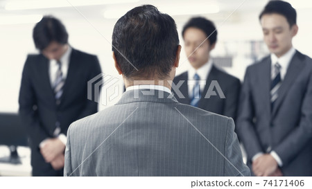 A businessman receiving a sermon A businessman receiving a sermon 74171406