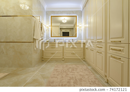 Modern luxury beige and golden bathroom 74172121