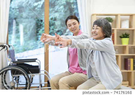 Recreational seniors and caregivers 74176168