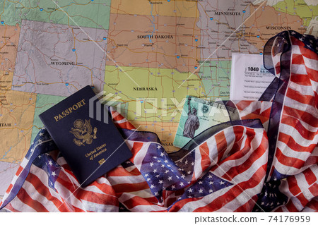 Preparation application 1040 U.S. Individual Income Tax Return Stimulus economic tax return American passport on U.S. map 74176959