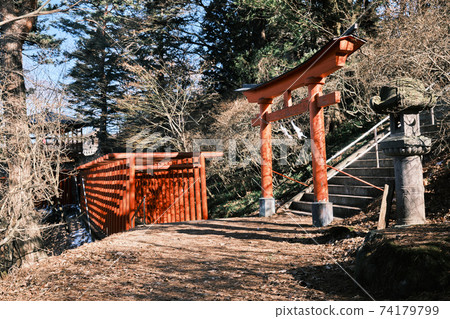 Bright red torii Japanese shrine Bright red torii Japanese shrine 74179799