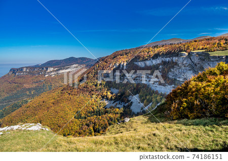 French countryside. Pas de l'Aubasse: View of the heights of the Vercors, the marly hills and the valley Val de Drome French countryside. Pas de l'Aubasse: View of the heights of the Vercors, the marly hills and the valley Val de Drome 74186151
