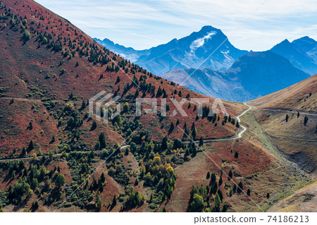 View of the mountains around Alpe d'Huez in the french Alps, France View of the mountains around Alpe d'Huez in the french Alps, France 74186213