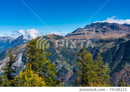 Landscape view of the mountains around Le Bourg d'Oisans in France 74186215