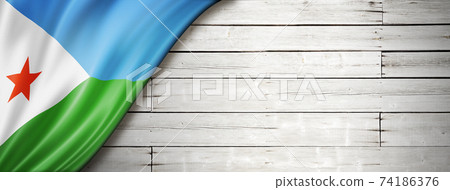 Djibouti flag on old white wall banner Djibouti flag on old white wall banner 74186376