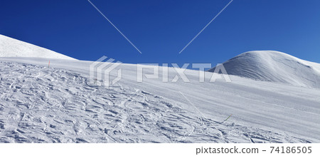Ski slope and blue clear sky in nice day 74186505