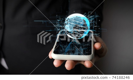 Human hand holding mobile phone with earth globe holographic technology 74188246