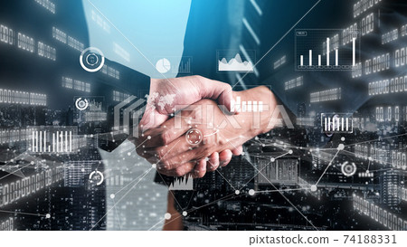 Imaginative visual business handshake with computer graphic of investment data Imaginative visual business handshake with computer graphic of investment data 74188331