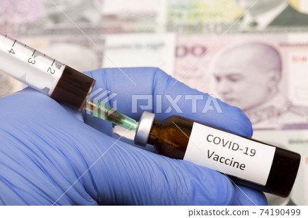 Vaccine against Covid-19 on the background of Cambodian riel 74190499