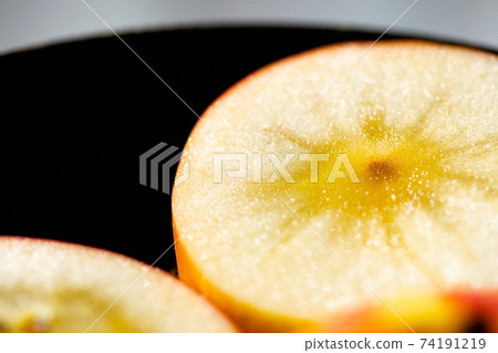 Sliced phantom apple (komitsu) Sliced phantom apple (komitsu) 74191219