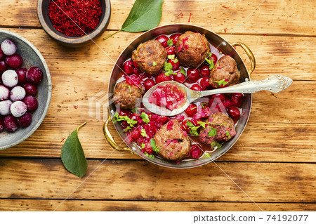 Kufta in cherry sauce Kufta in cherry sauce 74192077