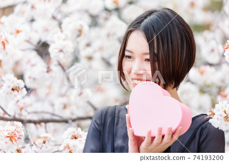 Sakura present young woman Sakura present young woman 74193200