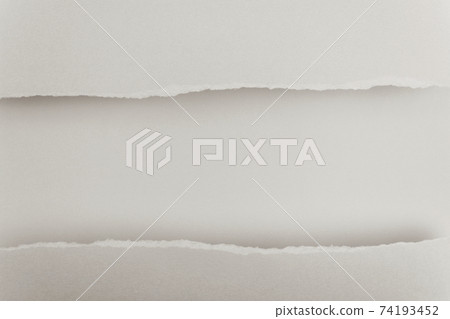 Ripped paper edge with copy space, beige background. 74193452