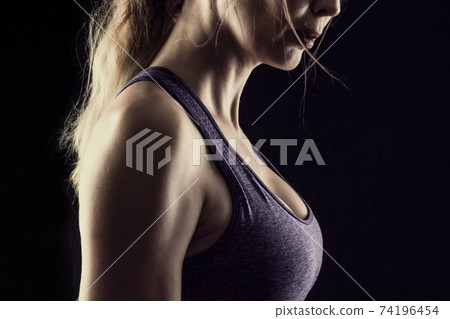Slim beauty athletic woman on black background Slim beauty athletic woman on black background 74196454