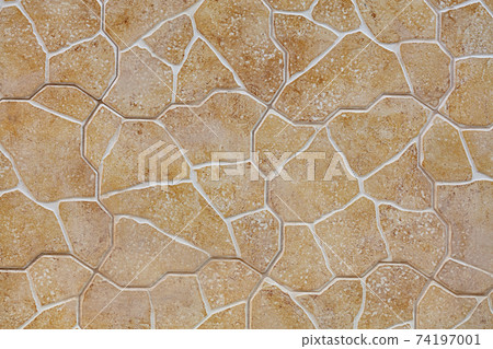 Limestone stone wall texture and background, beige golden limestone building tiles. 74197001