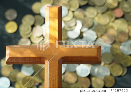 I took a cross with a coin in the background. I took a cross with a coin in the background. 74197423