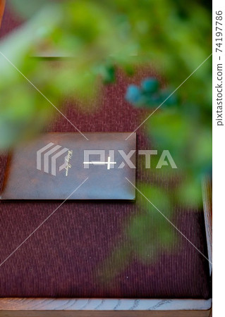 Program placed in the chapel seat 74197786