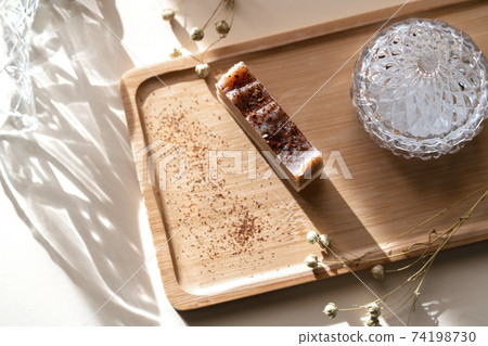 Wooden tray with handmade soap from natural ingredients. 74198730