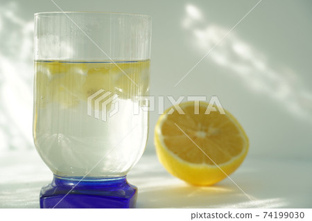 Lemon tea and lemon on white background Lemon tea and lemon on white background 74199030