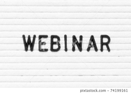 Black color letter in word webinar on white felt board background 74199161