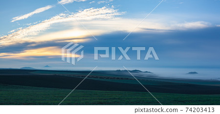 Landscape covered with fog in Central Bohemian Uplands, Czech Republic. Landscape covered with fog in Central Bohemian Uplands, Czech Republic. 74203413