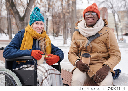 Happy couple in the park 74204144