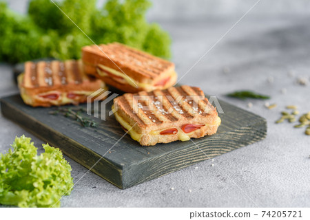 Delicious fresh toast grill with cheese and ham Delicious fresh toast grill with cheese and ham 74205721