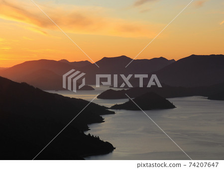 Sunset scene on the Queen Charlotte track. 74207647