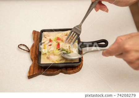 Boiled seafood and vegetables in white cream Boiled seafood and vegetables in white cream 74208279