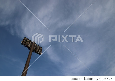 Stadium lighting and winter sky 74208697