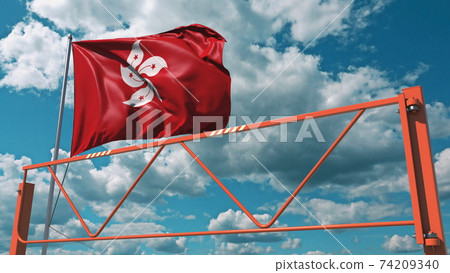 Manual swing arm road barrier and flag of Hong Kong. Restricted entry related 3d rendering Manual swing arm road barrier and flag of Hong Kong. Restricted entry related 3d rendering 74209340