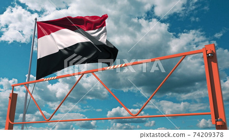 Flag of Yemen and swing arm barrier. Entry ban conceptual 3d rendering 74209378