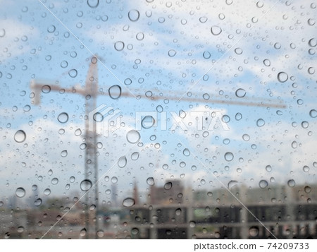 Close-up of water drops on glass surface as background Close-up of water drops on glass surface as background 74209733