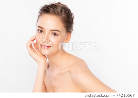Beautiful young woman with clean fresh skin on white background, Face care, Facial treatment Beautiful young woman with clean fresh skin on white background, Face care, Facial treatment 74210567