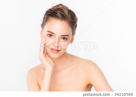 Beautiful young woman with clean fresh skin on white background, Face care, Facial treatment 74210569